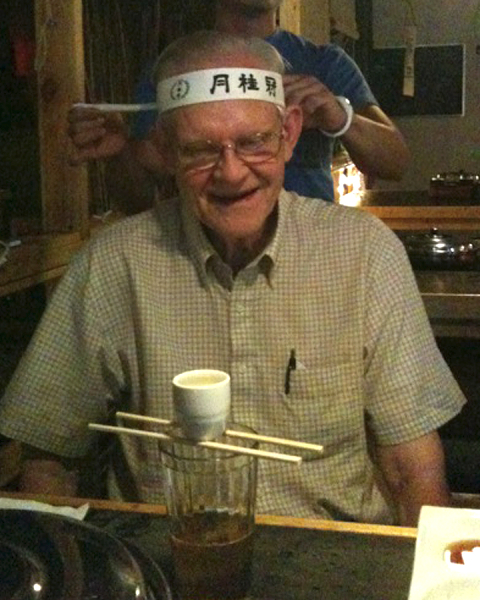 Dad preparing to indulge in a ‘sake bomb’ in Stillwater, OK 2010